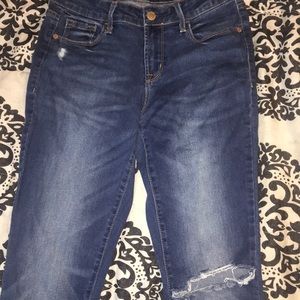 Dark blue ripped jeans